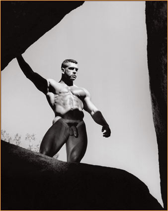 Jim French original gelatin silver print depicting a male nude standing on a rock formation